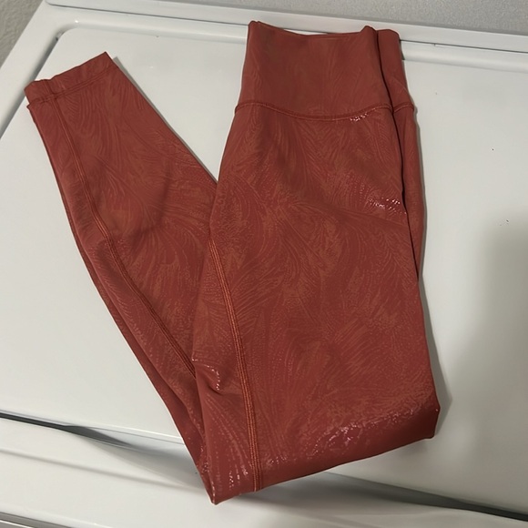 Lululemon leggings. Pink with a subtle pattern, size 4, great condition. - Picture 6 of 7